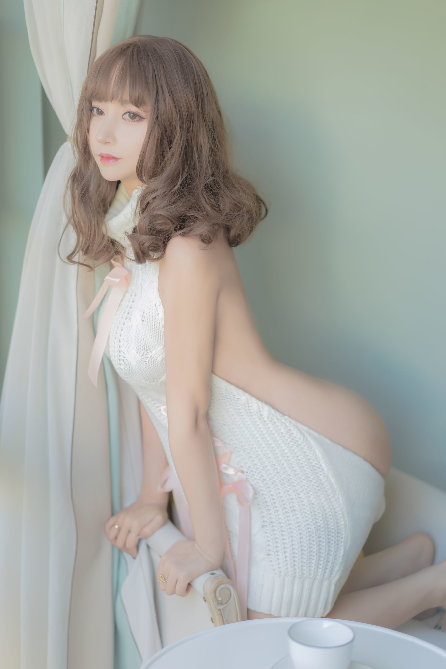10030