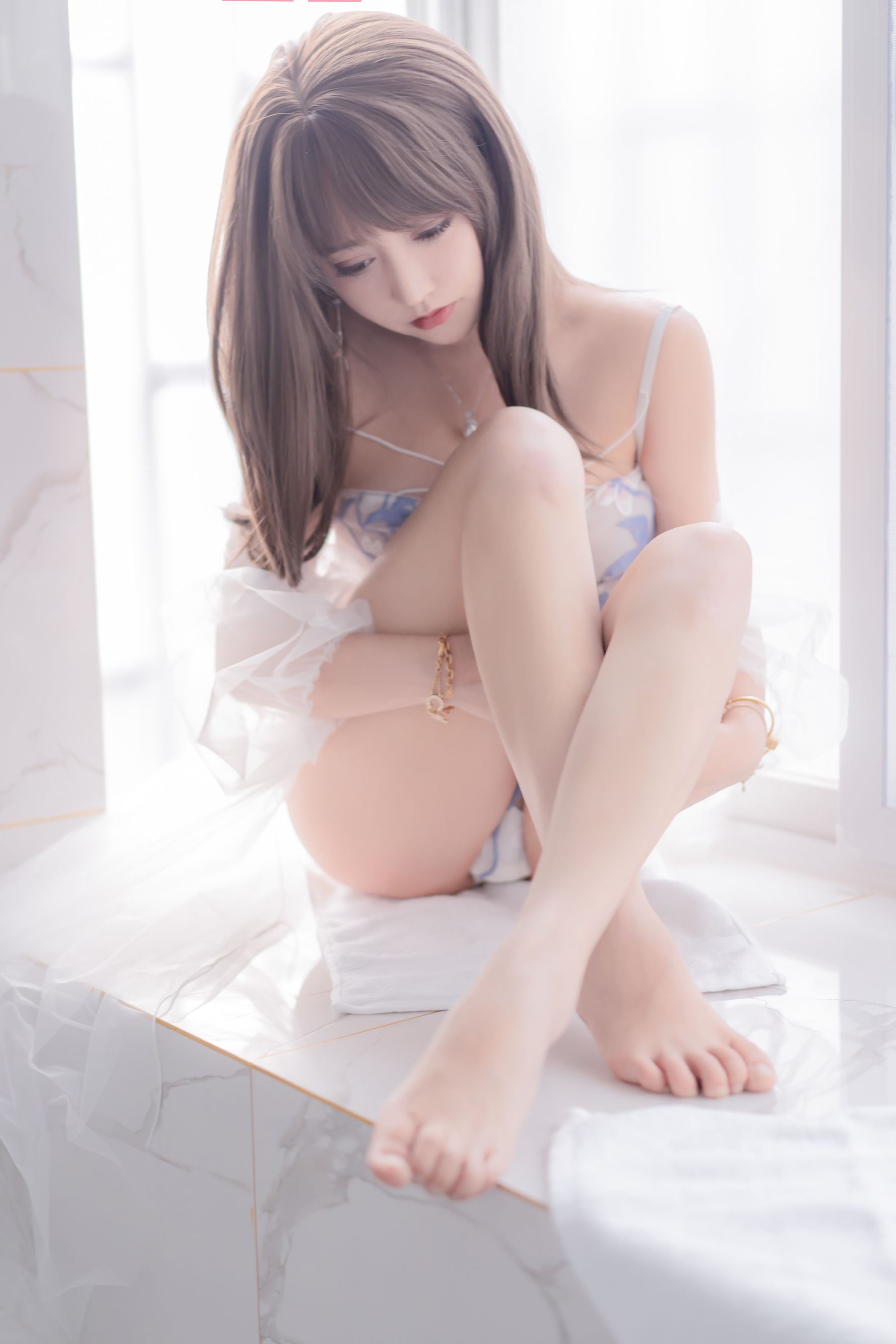 10032